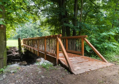 Rekonstrukce dřevěného mostu v Podbřezí